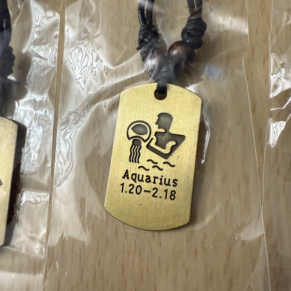 Black and Gold Tone Zodiac Pendant Necklace BUYERS CHOICE